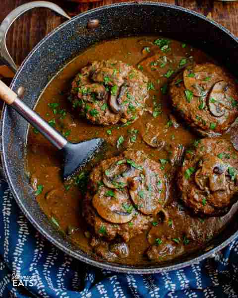 Enjoy a plate of this delicious Salisbury Steak with Gravy – tender beef patties with hidden caulifl...