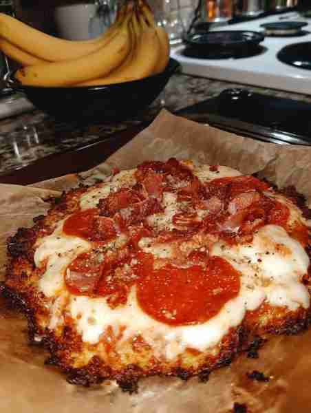 Keto Cauliflower Crust Pizza (10–12" pizza, serves 4) Crust 3 cups riced cauliflower (fresh or froze...