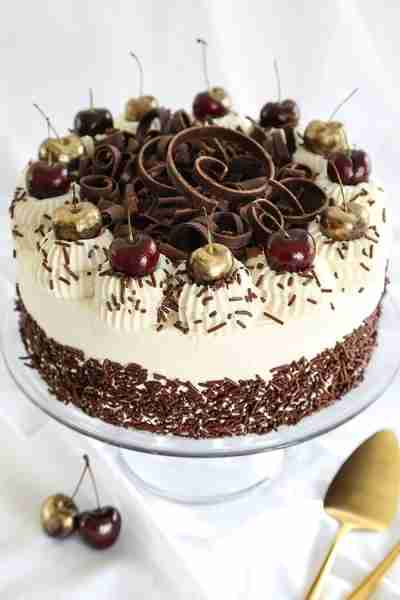 Title: Black Forest Cake Ingredients: - 1 3/4 cups all-purpose flour - 2 cups sugar - 3/4 cup unswee...