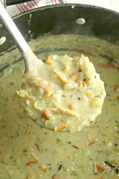 Copycat Panera Chicken & Wild Rice Soup tastes so much better made at home and extremely cheap, too!...