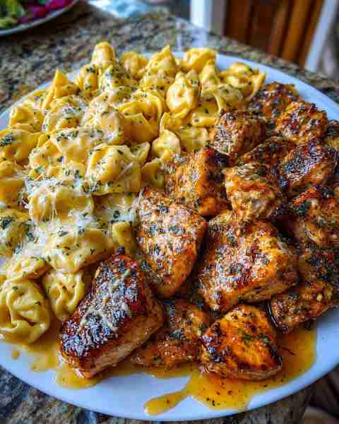 Garlic Butter Cajun Chicken with Creamy Tortellini and Velveeta Cheese Sauce Ingredients: 1.5 lbs bo...