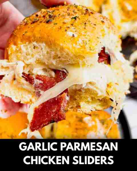 Garlic Parmesan Chicken Sliders are a delicious mini sandwich recipe loaded with shredded rotisserie...