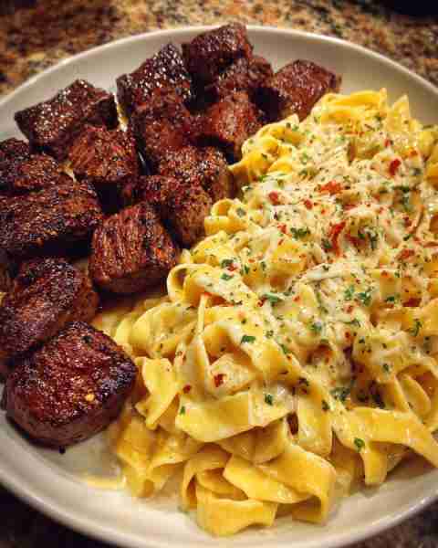 Garlic Butter Steak with Cheesy Fettuccine in Cheddar Sauce Ingredients: 1 ½ lbs sirloin or ribeye s...