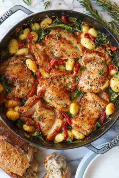Sun Dried Tomato Chicken and Gnocchi - Tender, juicy chicken thighs in an AMAZING garlicky sun dried...