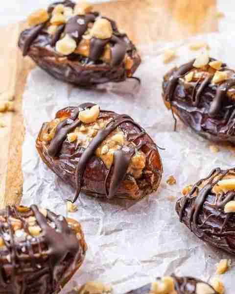 Snicker Stuffed Dates - Chocolatey + Chewy + Peanut-Buttery + with a Touch of Sea Salt Oh yes! A pe...