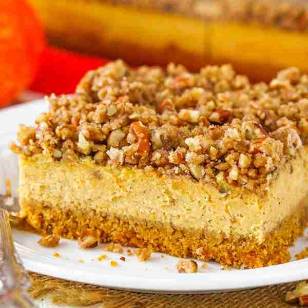 This Pecan Streusel Pumpkin Cheesecake recipe is one of my favorite fall pumpkin desserts! The thick...