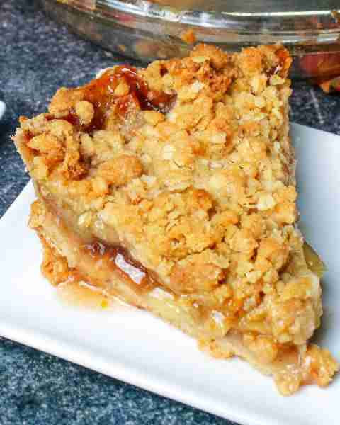 Apple pie with hints of lemon and orange in every bite and a perfectly golden brown crumbly top!