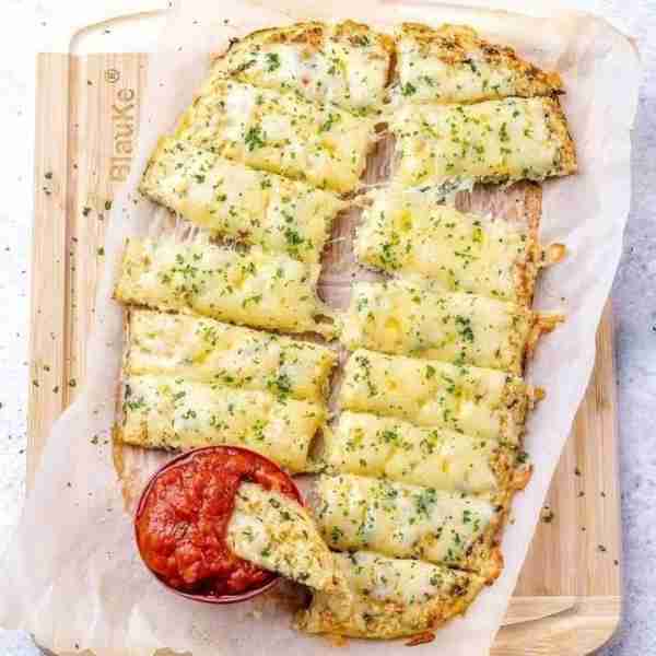 Cheesy Cauliflower “Breadsticks” are such a treat! Gluten-free, and Low Carb friendly – but that doe...