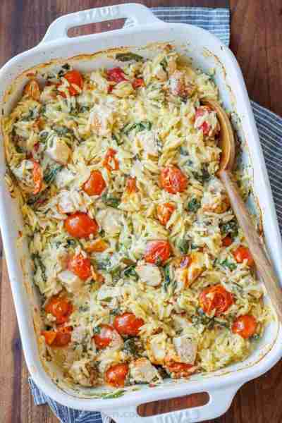 This creamy and cheesy Chicken Orzo Bake is an effortless dinner, and the orzo pasta cooks right in...