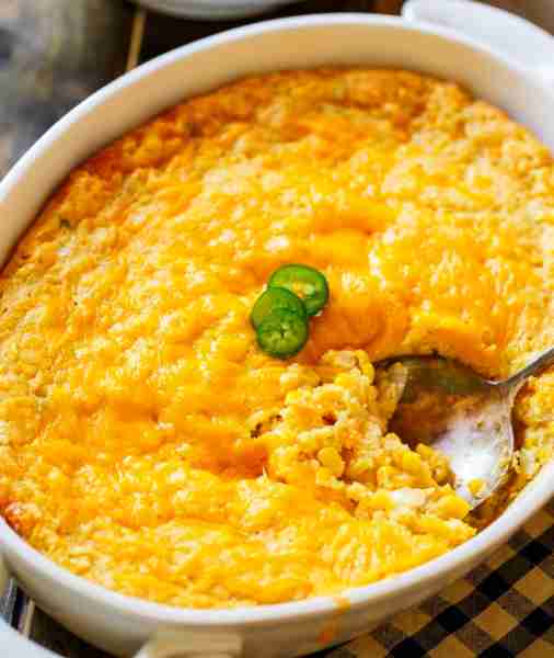 Both whole kernel corn and creamy corn are combined with sour cream, an egg, onion, corn bread mix,...