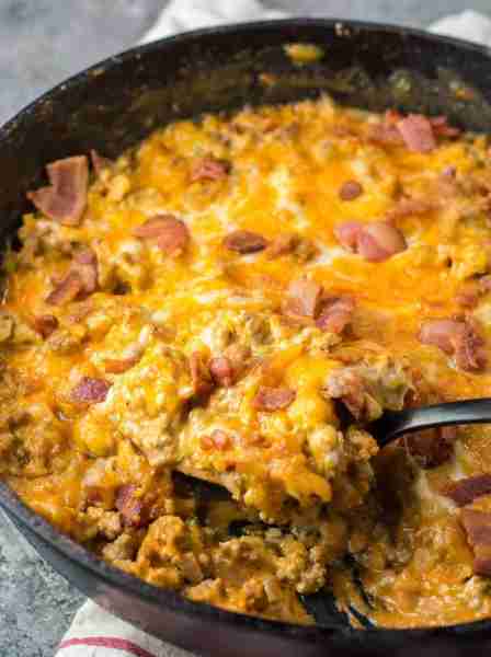 This keto cheeseburger casserole skillet is a rich and hearty dish packed with beef, bacon, and chee...