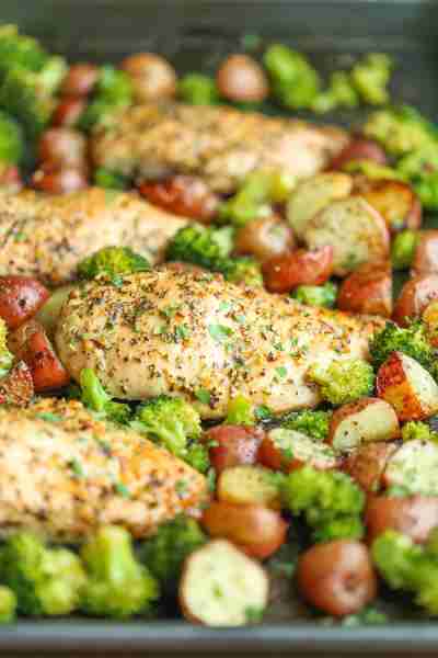 One Pan Honey Garlic Chicken and Veggies - Tender, juicy chicken breasts baked to perfection with po...