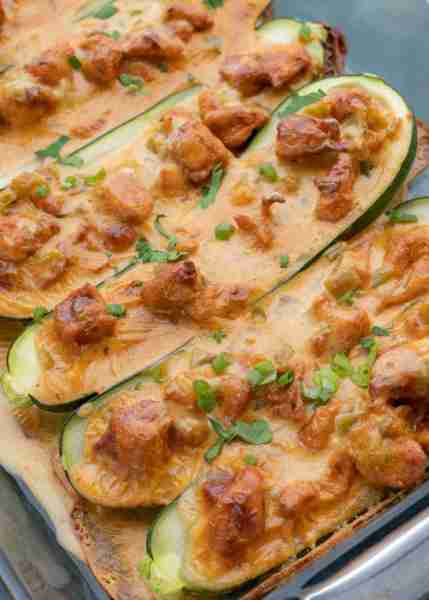 The perfect zucchini boat is stuffed with your favorite pollo con queso!