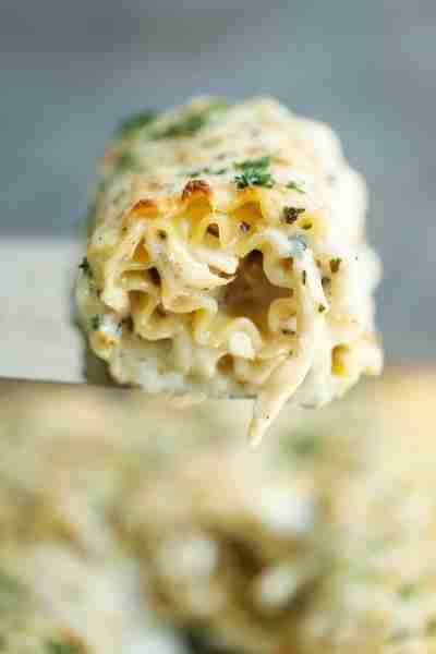 Lasagna Rolls Up with Garlic Parmesan Cream Sauce - Freezer-friendly make-ahead lasagna roll ups wit...