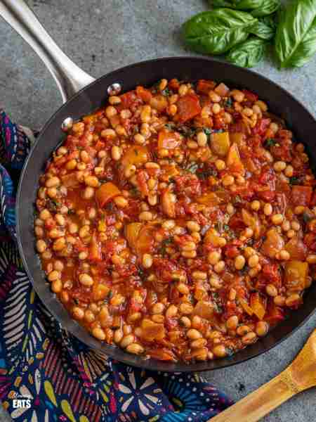 Mediterranean Tomatoes and White Beans - delicious rich tomatoes with peppers and white beans make t...
