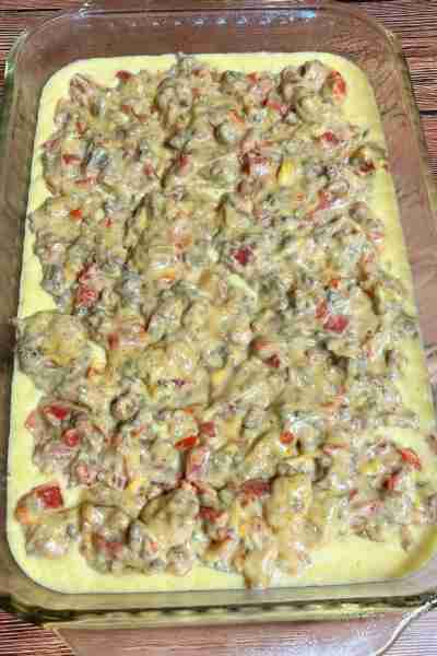 Cowboy Cornbread Casserole Ingredients 1/2 yellow or white onion diced 1/2 red bell pepper seeds an...