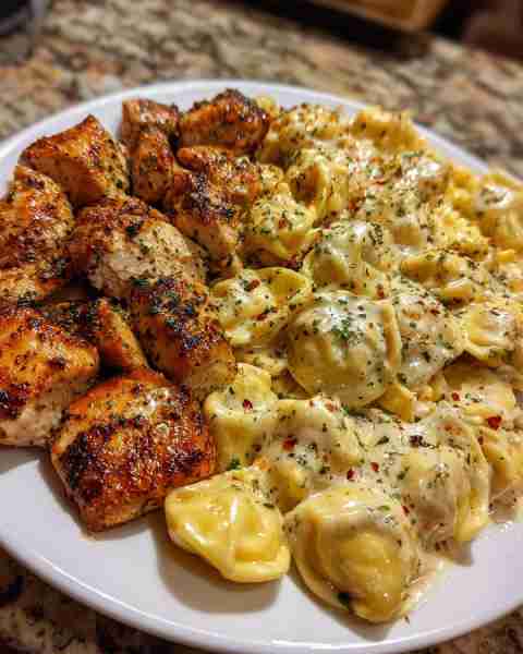 Cajun Chicken Tortellini in Creamy Velveeta Garlic Parmesan Alfredo Ingredients: 1.5 lbs boneless, s...