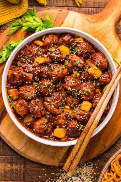 🍗🌶️ Made with deep-fried ground chicken balls, Tamari, red chili pepper, and ginger, this Chicken M...