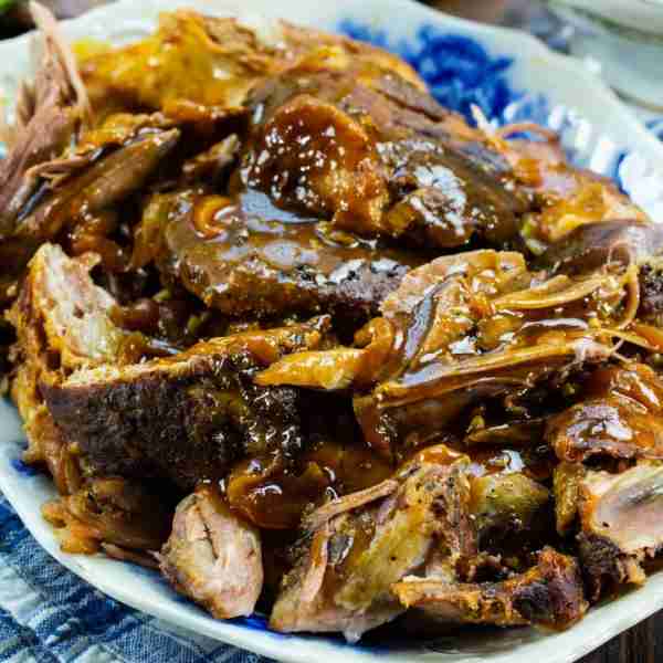 Slow Cooker Apple Cider Pork- tender, juicy pork is covered in a sweet and tangy apple-flavored sauc...