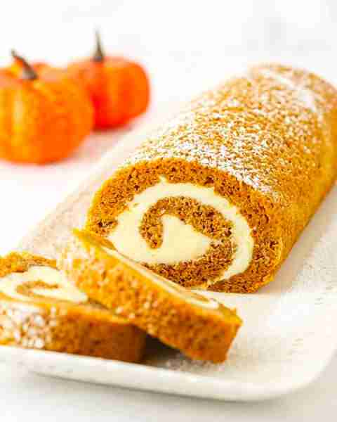This easy Pumpkin Cake Roll is made with tender pumpkin cake and a heavenly cream cheese filling. Pl...