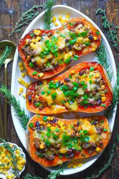 🍅🌽 Southwestern-Style Butternut Squash Stuffed with Ground Beef, Black Beans, Corn, Tomatoes, Gree...