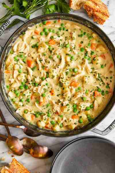 Chicken and Dumplings - A creamy, hearty chicken stew with vegetables and homemade light and fluffy...