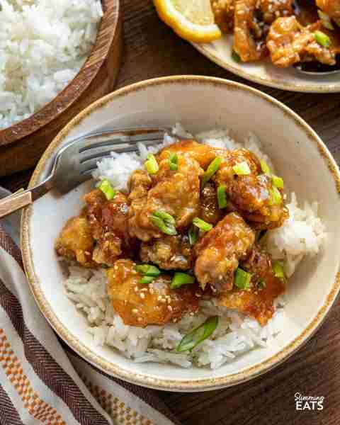 https://www.slimmingeats.com/blog/chinese-lemon-chicken Chinese Lemon Chicken - tender chicken bites...