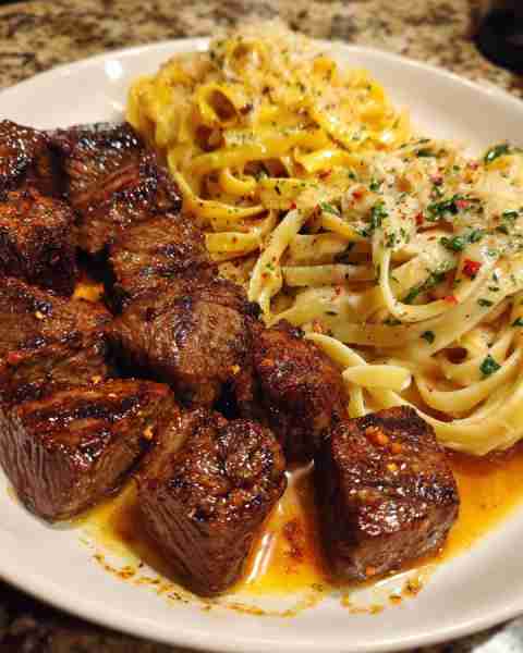 Garlic Butter Steak Tips with Cheesy Linguine Ingredients: 1 ½ lbs sirloin or ribeye steak, cut into...
