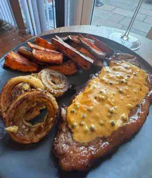 So unhealthy but yummy… Steak with peppercorn sauce, sweet potato wedges and homemade onion rings by...