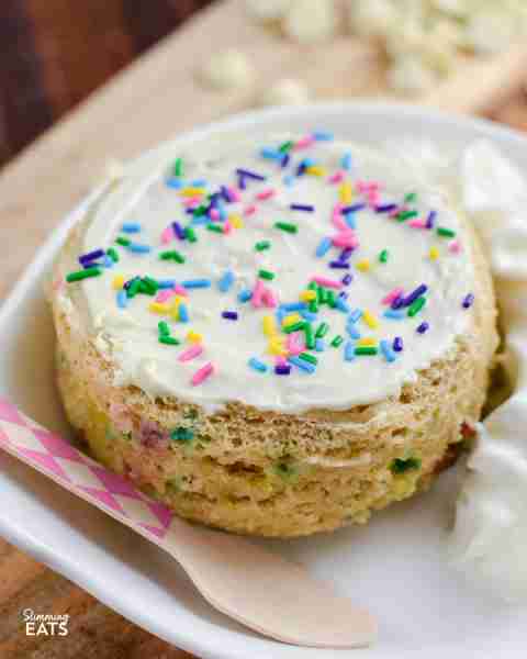 Funfetti Birthday Cake Mug Cake – a delicious vanilla flavour oat cake scattered with rainbow sprink...