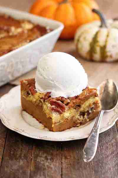 Enjoy this ultimate fall dessert: Pumpkin Spice Dump Cake! A simple recipe filled with pumpkin spice...