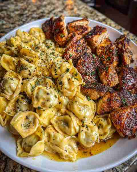 Velveeta Cajun Chicken Tortellini in Garlic Cream Sauce** Ingredients: 1 (20 oz) pkg refrigerated ch...