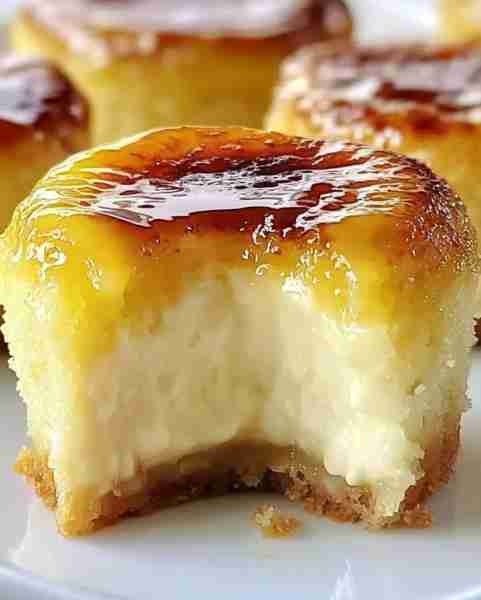 Mini Crème Brûlée Cheesecakes with Caramel Topping Ingredients 1 cup graham cracker crumbs 2 tablesp...