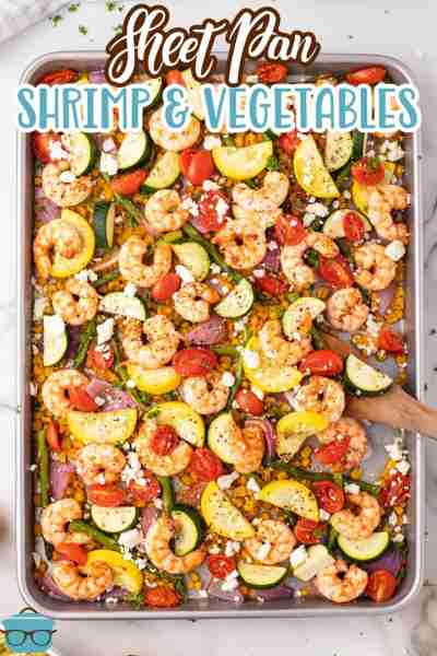 Colorful and perfectly seasoned, this recipe for Sheet Pan Shrimp and Vegetables is ready in 40 minu...