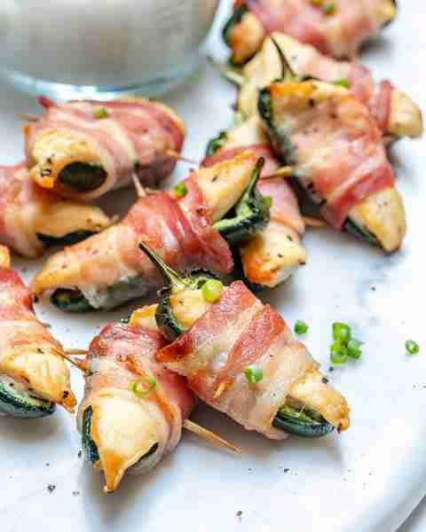 Bacon Wrapped Chicken Jalapeño Bites make for a little FUN “night-in” project for ya! We love making...