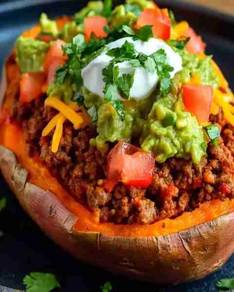 Stuffed Sweet Potato with Beef, Cheddar, and Guacamole Ingredients Sweet potatoes – 4 medium-sized,...