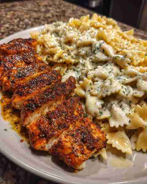 Velveeta Alfredo Chicken Bowties in Cajun Garlic Parmesan Cream Ingredients: 1 pound bowtie pasta 1....