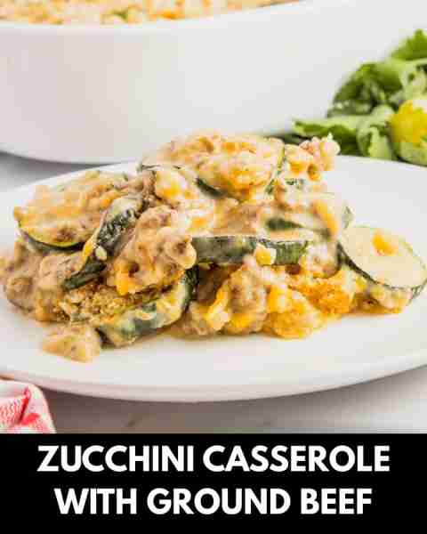 Zucchini Casserole with Ground Beef is a hearty casserole with layers of sliced zucchini, hamburger...
