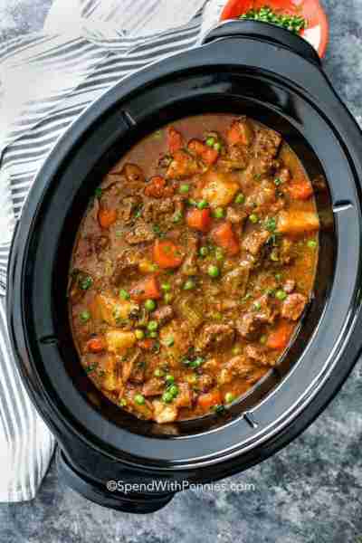 Comment RECIPE to get the recipe! This cozy Crockpot beef stew is loaded with tender beef, hearty ro...