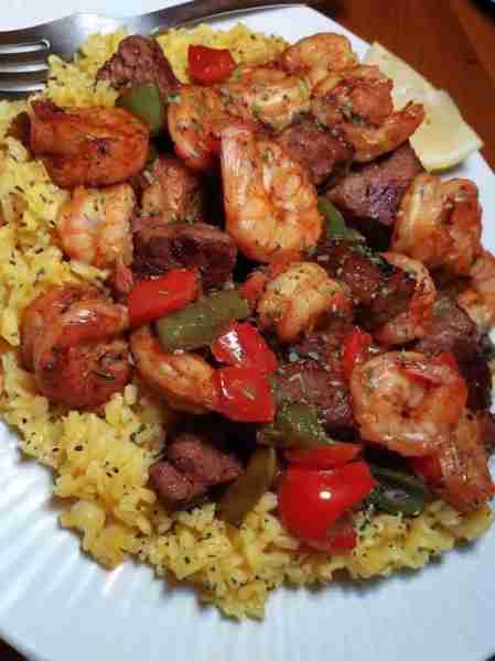 Garlic Butter Steak and Shrimp with Peppers over Yellow Rice YAY OR NAY! . Ingredients For the Steak...