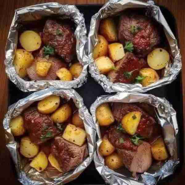 My hubby begs me to make this recipe at least once per week.Garlic Butter Steak and Potato Foil Pack...