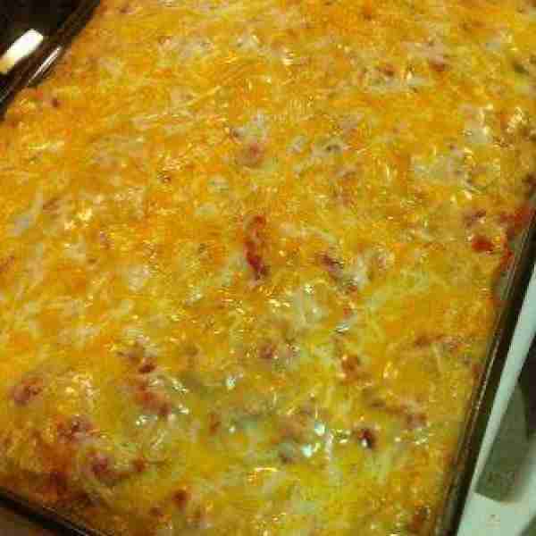 Delicious Mexican Casserole 1 bag Nacho Doritos, crushed. 2C shredded chicken 2C - 3C shredded chees...
