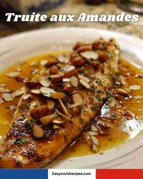 🐟🌰 Truite aux Amandes Trout fillets cooked in butter and topped with toasted almonds for a nutty,...