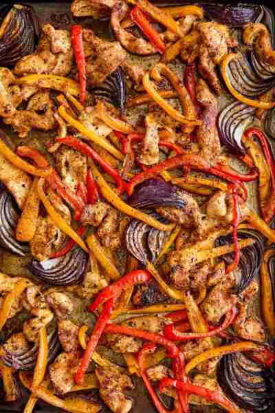 Sheet Pan Chicken Fajitas - SHEET PAN DINNER! A perfect weeknight meal with tender chicken + crisp-t...