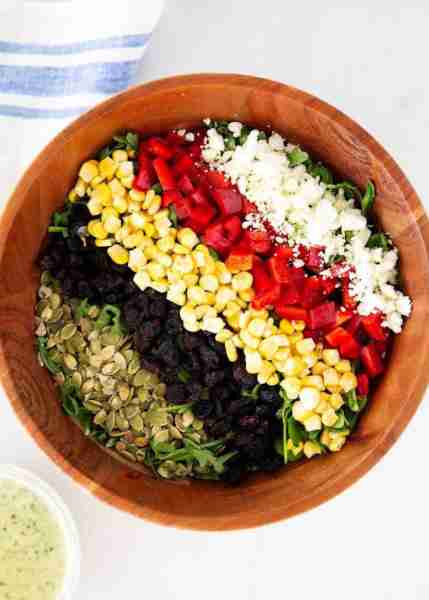 This copycat of the Wildflower and Gladly favorite is loaded with arugula, roasted red peppers, corn...
