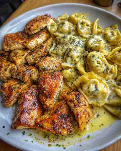 Chicken Tortellini in Creamy Cajun Garlic Parmesan Sauce Ingredients: 1.5 lbs boneless, skinless chi...