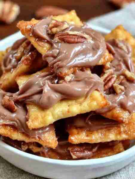 Keto Chocolate Pecan Crunch Bites Ingredients For the “Cracker” Base: 1 ½ cups mozzarella cheese (sh...