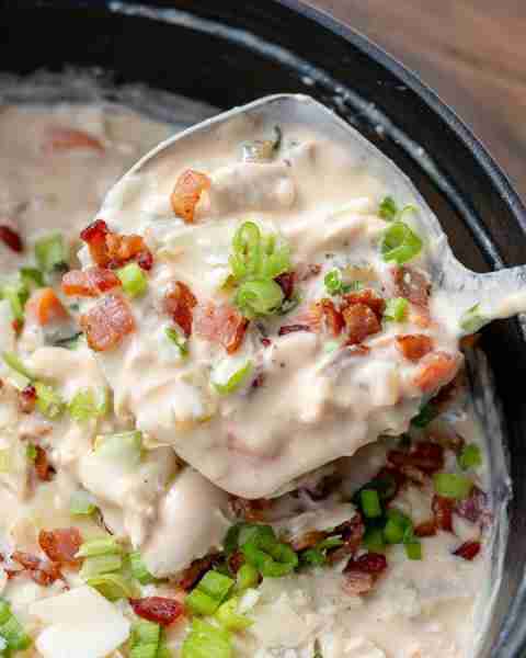Cozy up with this favorite family dinner recipe! Creamy Crack Chicken Soup is loaded with chicken, c...