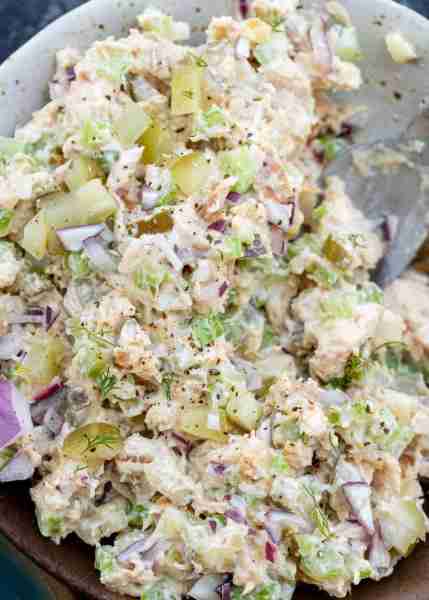 This Dill Pickle Chicken Salad recipe is a fresh and tangy twist on a beloved lunch classic! This lo...