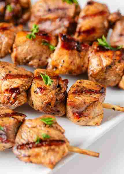 Juicy chicken pieces are marinated in a tangy balsamic glaze, then grilled to perfection for that ir...